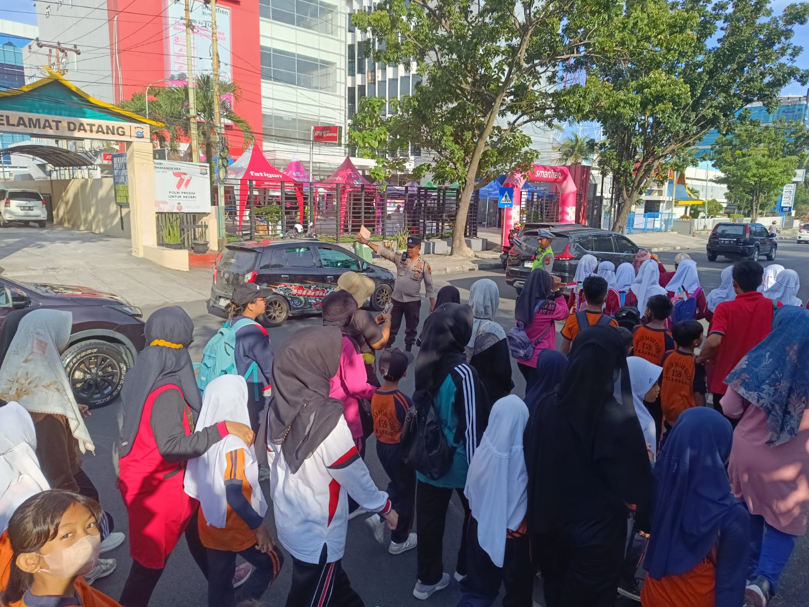 Kapolsek Pekanbaru Kota Laksanakan Pengamanan Acara HUT PGRI ke 78 dan HGN Tahun 2023