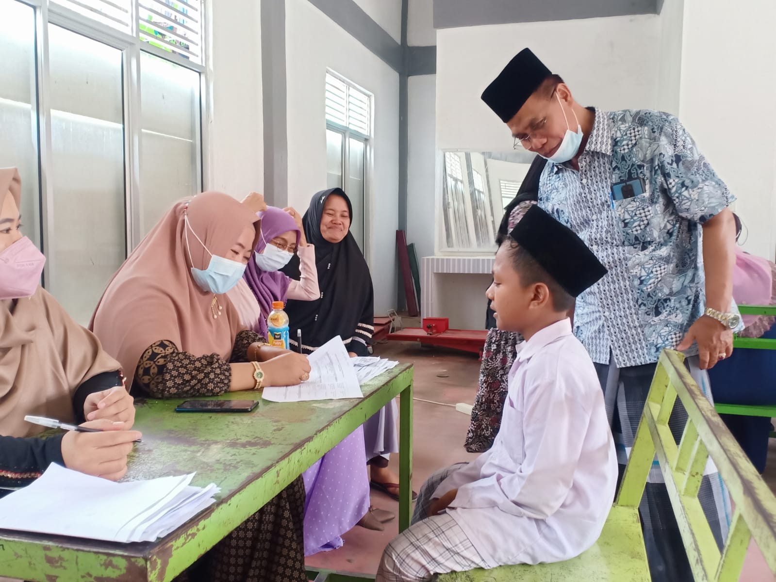 Ratusan Santri Ikuti Vaksinasi yang Digelar Polres Kampar di Ponpes Nurul Iman Desa Sumber Makmur