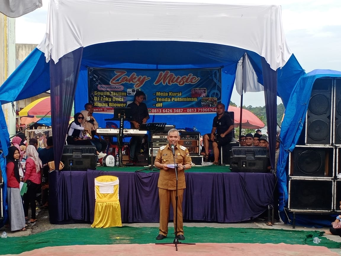 Kapolsek Tambang Pimpin Langsung Pengamanan Event Pacu Sampan di Danau Bingkuang