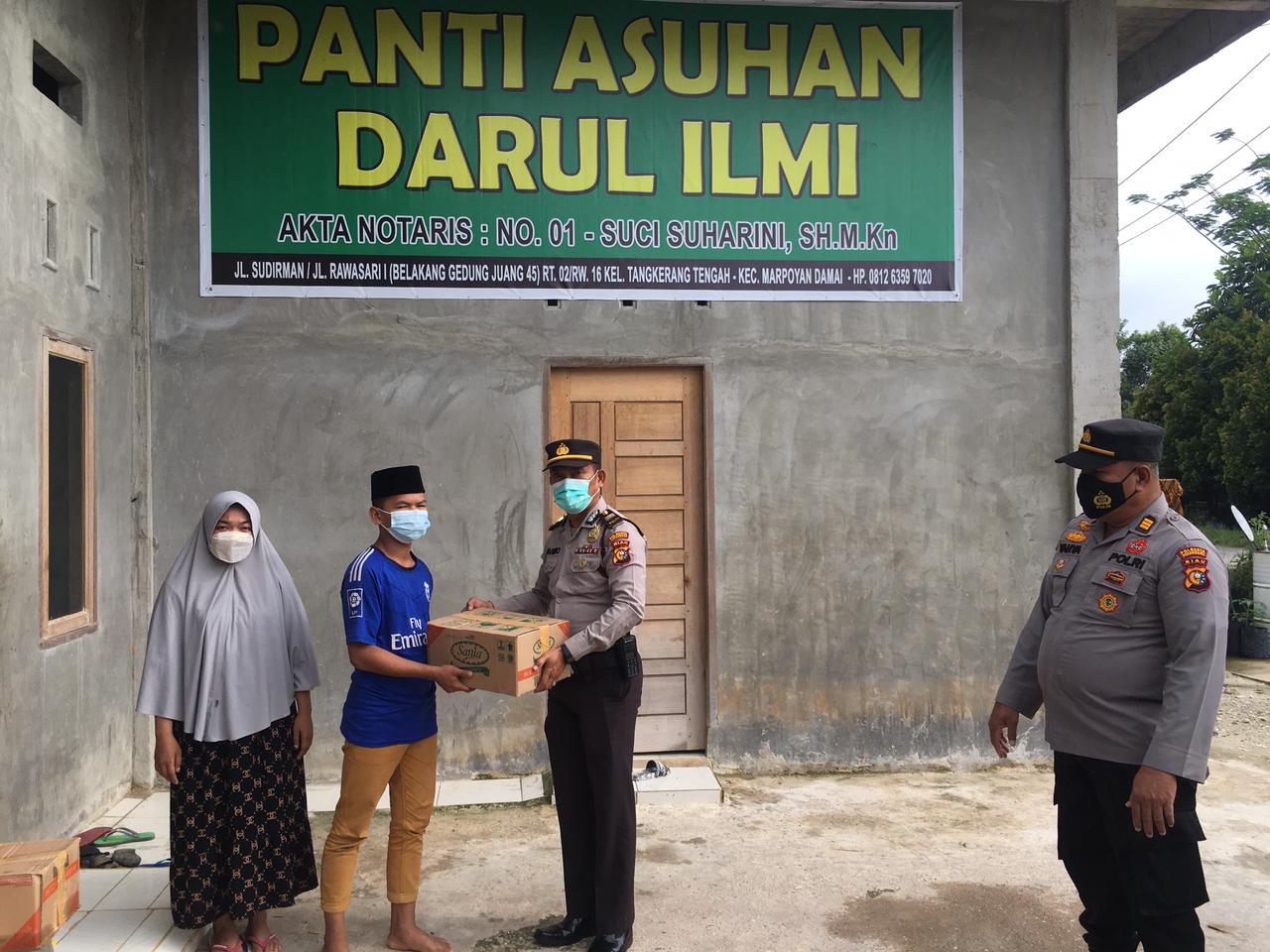 Polsek Bukit Raya Adakan Kegiatan Jum,at Berbagi ke Panti Asuhan Darul Ilmi