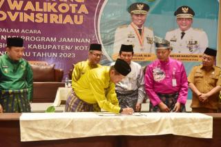 Hadiri Rakoor JKN,Wakil Bupati H.Syamsuddin Uti Tanda Tangani Komitmen Bersama Percepatan UHC Tahun 