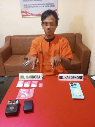Satuan Narkoba Polres Kampar Ringkus Pengedar Sabu di Langgini, Amankan 16,08 Gram Barang Bukti!
