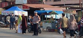 Ramadan Aman: Polsek Tapung Hulu Prioritaskan Pengamanan Pasar Takjil demi Kamtibmas