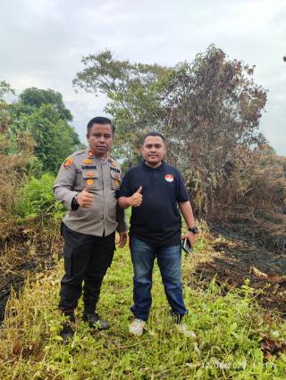 Kapolsek Tambang AKP Marupa Sibarani, SH.MH Pimpin Pemadaman Karlahut