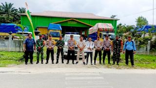 BKO Polres Kampar Kawal Pengiriman Kotak Suara dan Hasil Perhitungan Suara Pemilu Tingkat PPK