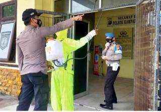 Cegah Penularan Covid-19,Polsek Kampar Kiri Hilir Rutin Lakukan Desinfeksi di Lingkungan Mako dan As