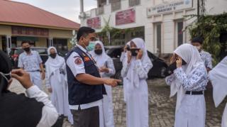 Cegah Penularan Covid-19, Badan Penanggulangan Bencana Lakukan Pembagian Masker Gratis
