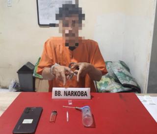 SATRESNARKOBA POLRES KAMPAR UNGKAP PENGGUNA SABU DI DESA GANTING DAMAI SITA 1,61 GRAM NARKOTIKA